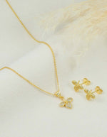 Set de cadena y aretes de hoja con piedras brillantes