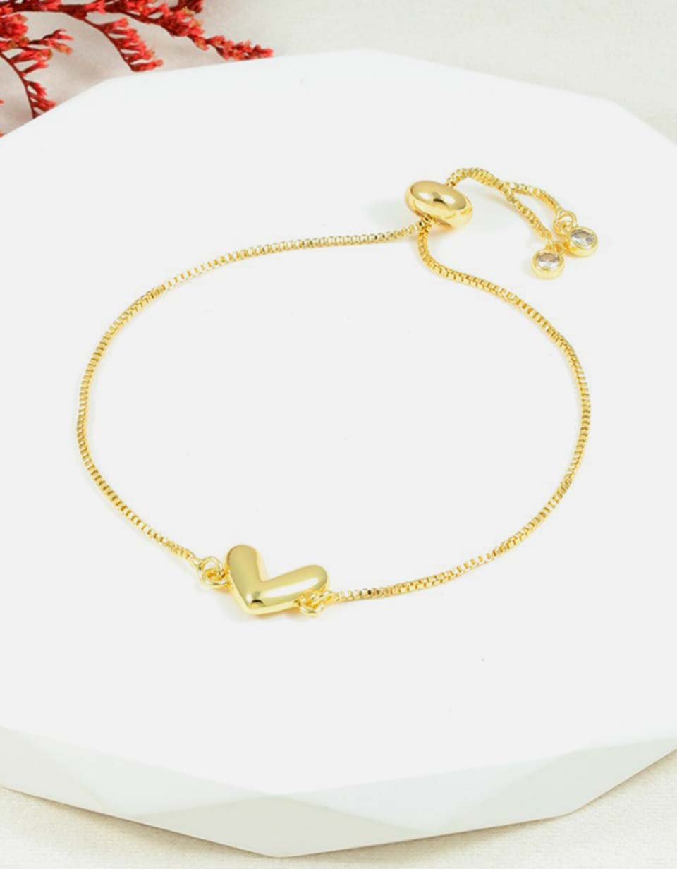 Pulsera de cadena con corazón dorado