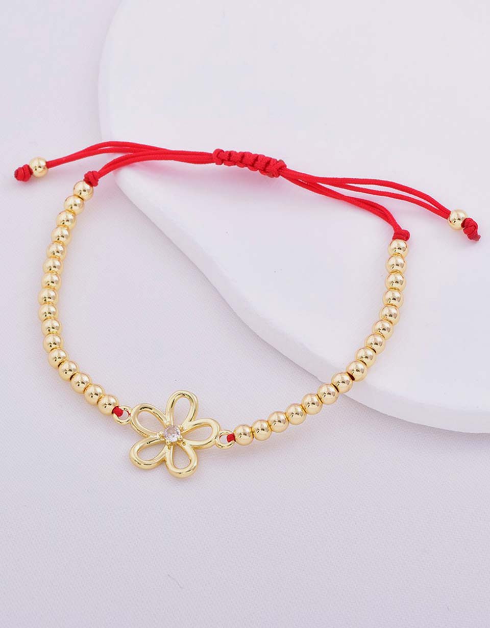 Pulsera con dije de flor y piedra brillante