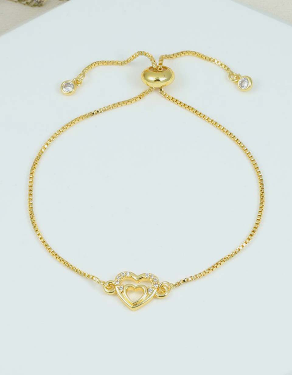 Pulsera con dije de corazón doble en Rodio