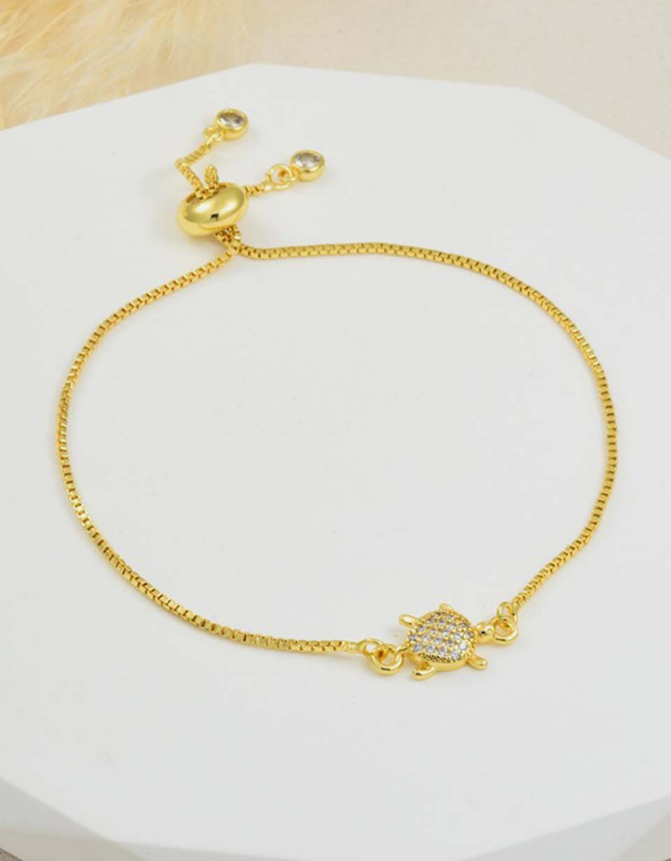 Pulsera con dije de tortuga en Rodio