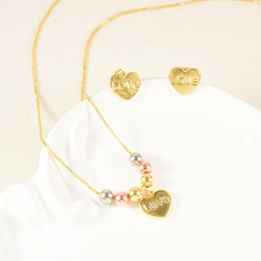 Set de collar y aretes dorados con corazón Love