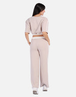 Conjunto mujer bicolor con top crop y pantalón recto