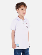 Polo urbano para niño con cuello camisero y estampados decorativos