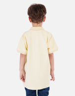 Polo urbano para niño con cuello camisero y estampados decorativos