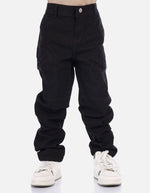 Pantalón tipo carpintero para niño con bolsillos decorativos