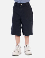 Bermuda carpintera para niño con bolsillos decorativos