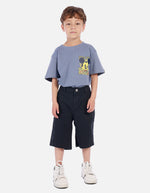 Bermuda carpintera para niño con bolsillos decorativos